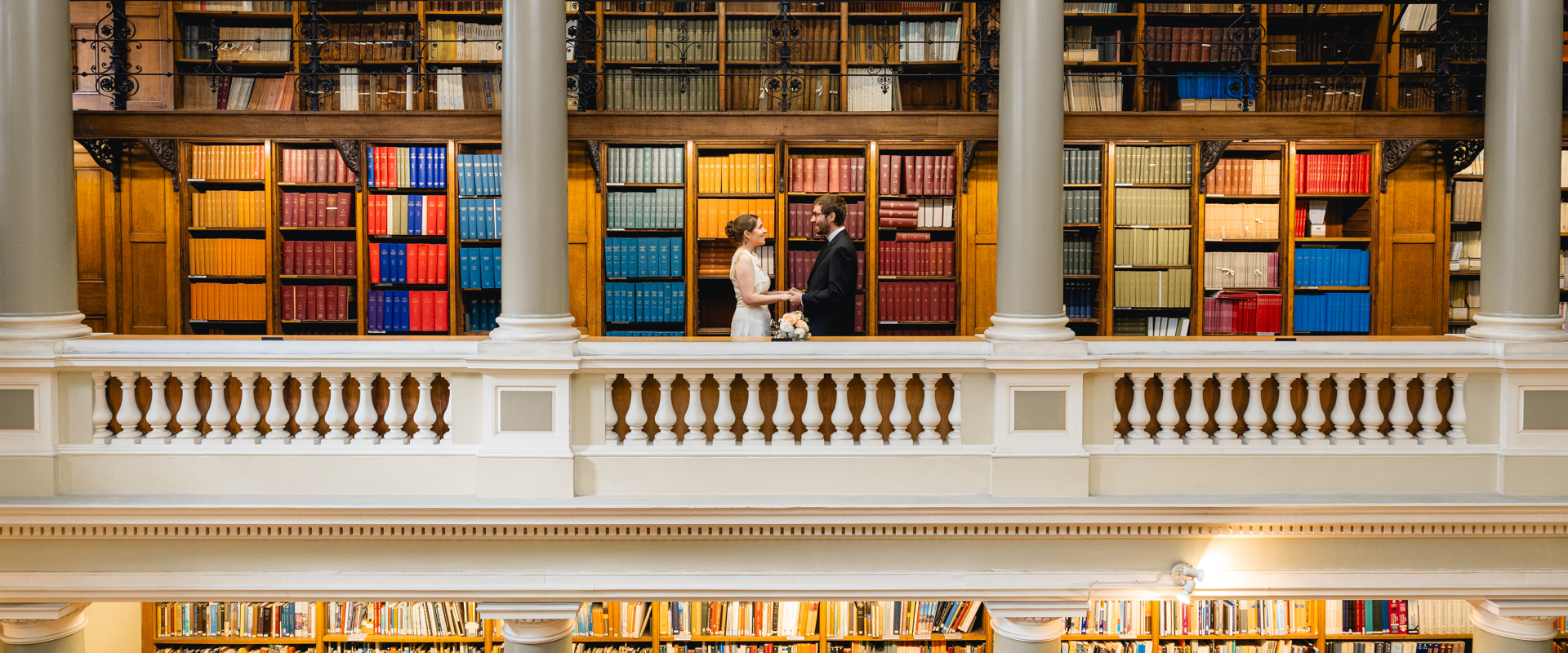 The Bride and the Groom seeing each other at the Upper Gallery of the Upper Library