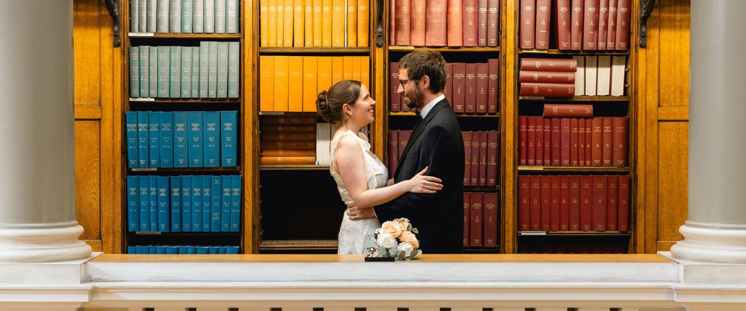 The Bride and the Groom were both looking at each other at the Upper Library
