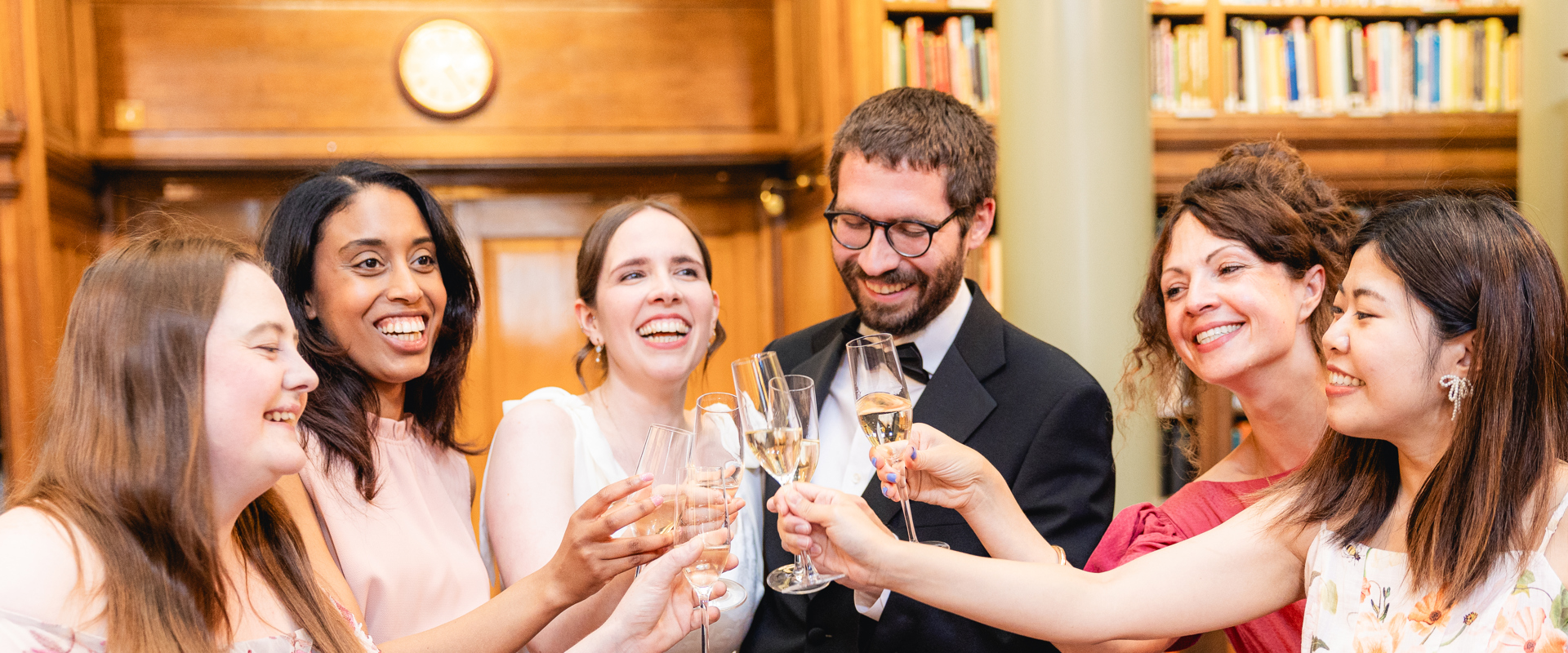 Guests cheered to the Bride and the Groom with glasses of bubble