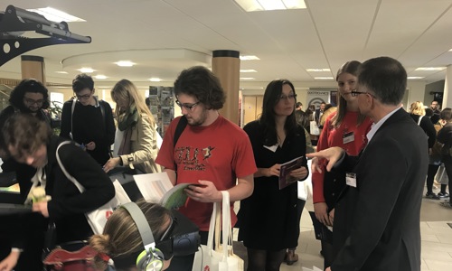 Group of students at an exhibition