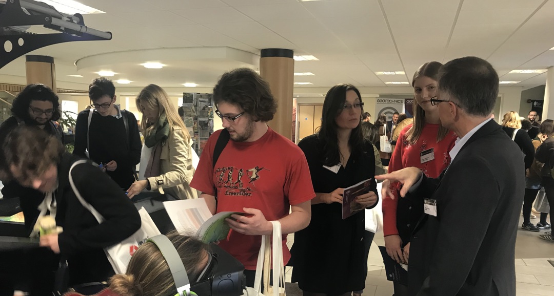 Group of students at an exhibition