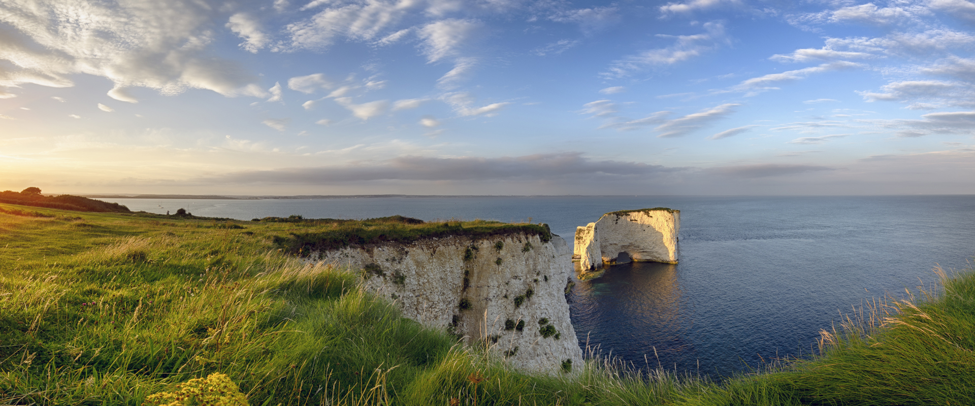 Sunset over chalky cliffs and ocean