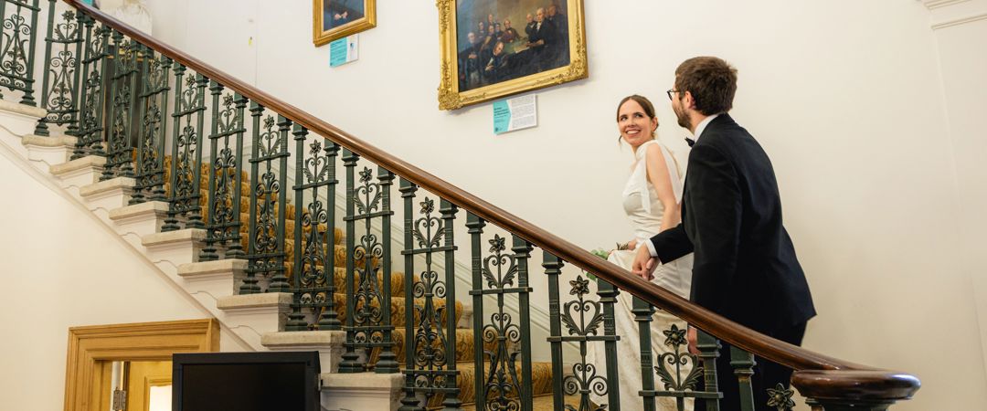 The Bride and the Groom were both walking up the Grand Staircase