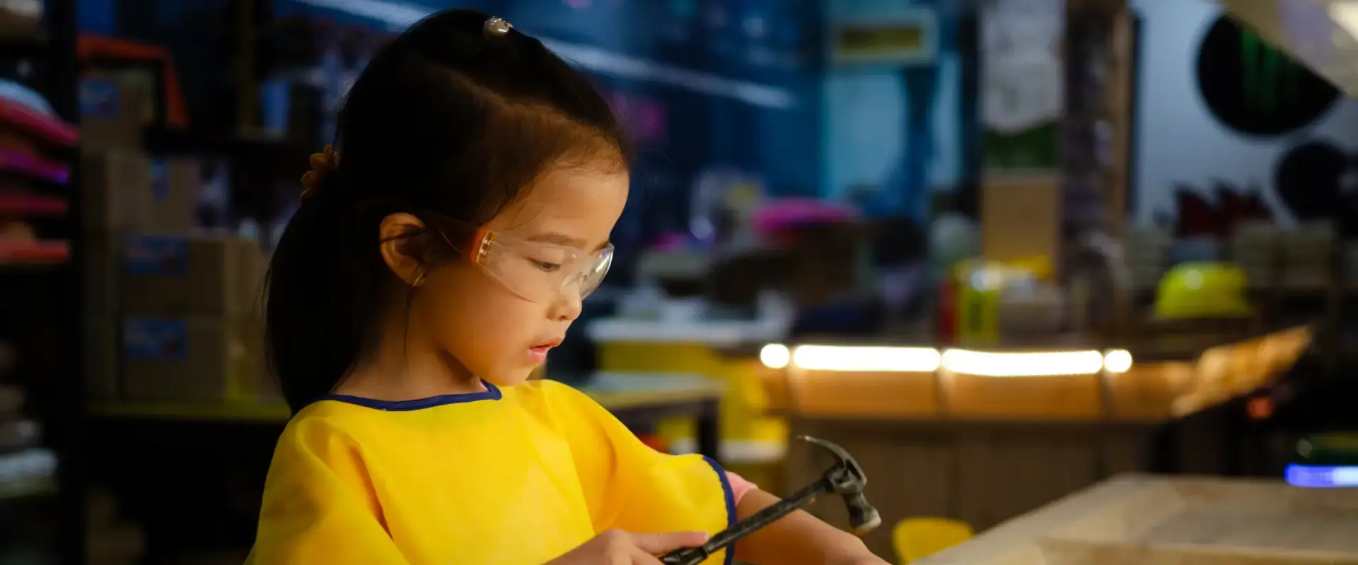 Child Examining Rock