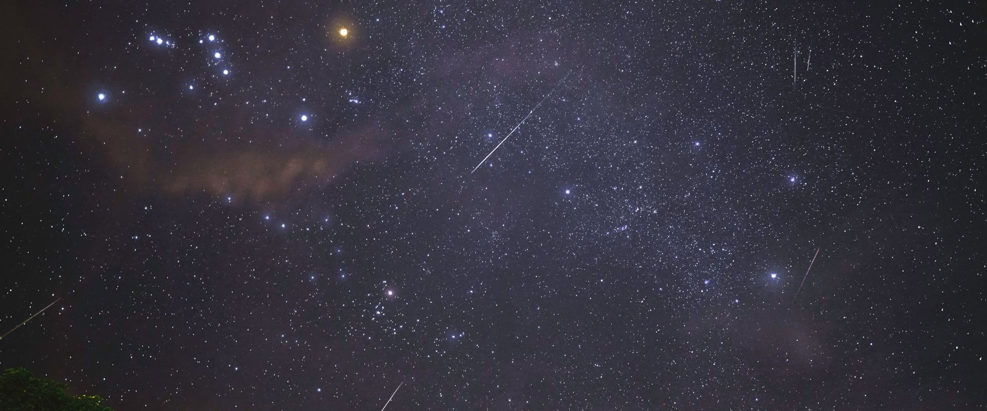 Starry sky at night capturing several shooting stars