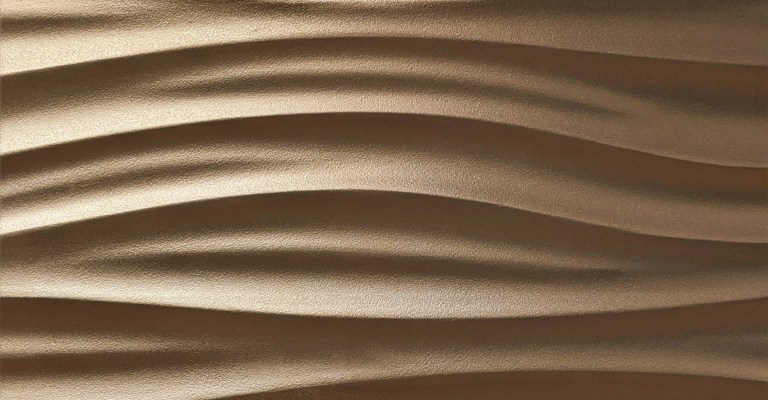 bronze coloured swirly background