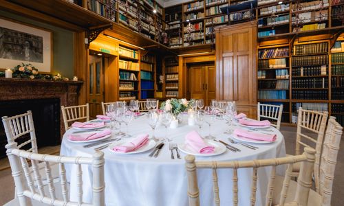 Roundtables setup for weddings in the Lower Library at The Geological Society