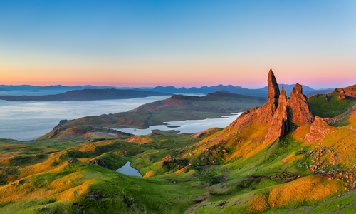 Old Man of Storr in morning sunlight, Isle of Skye, Scotland by Wayne Brittle (Shutterstock)
