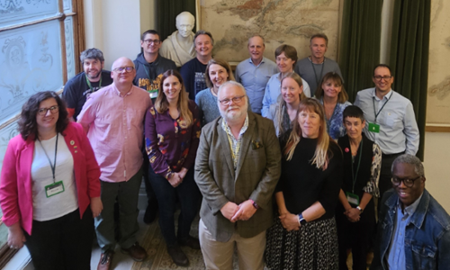 The Geological Society Council members 2024-2024 standing together on the stairway at Burlington House