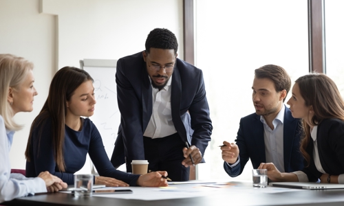 Group of professionals in discussion meeting 