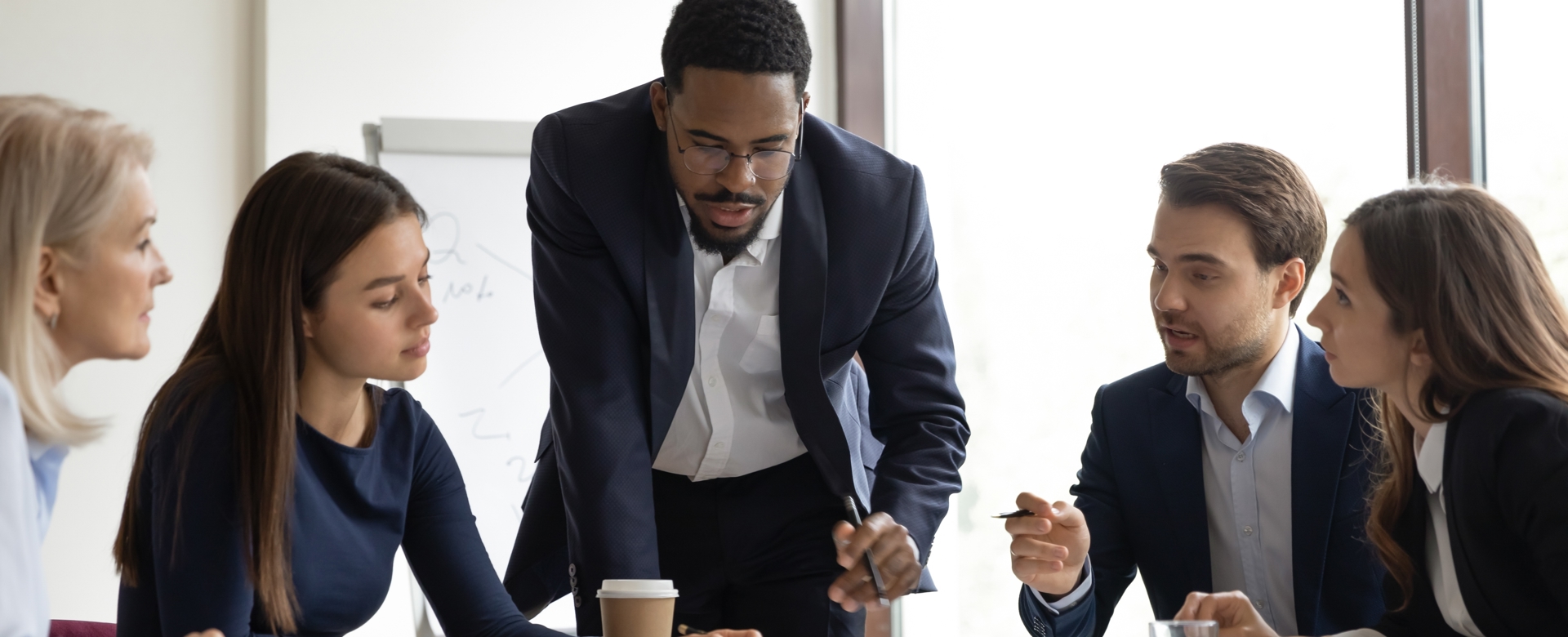 Group of professionals in discussion meeting 