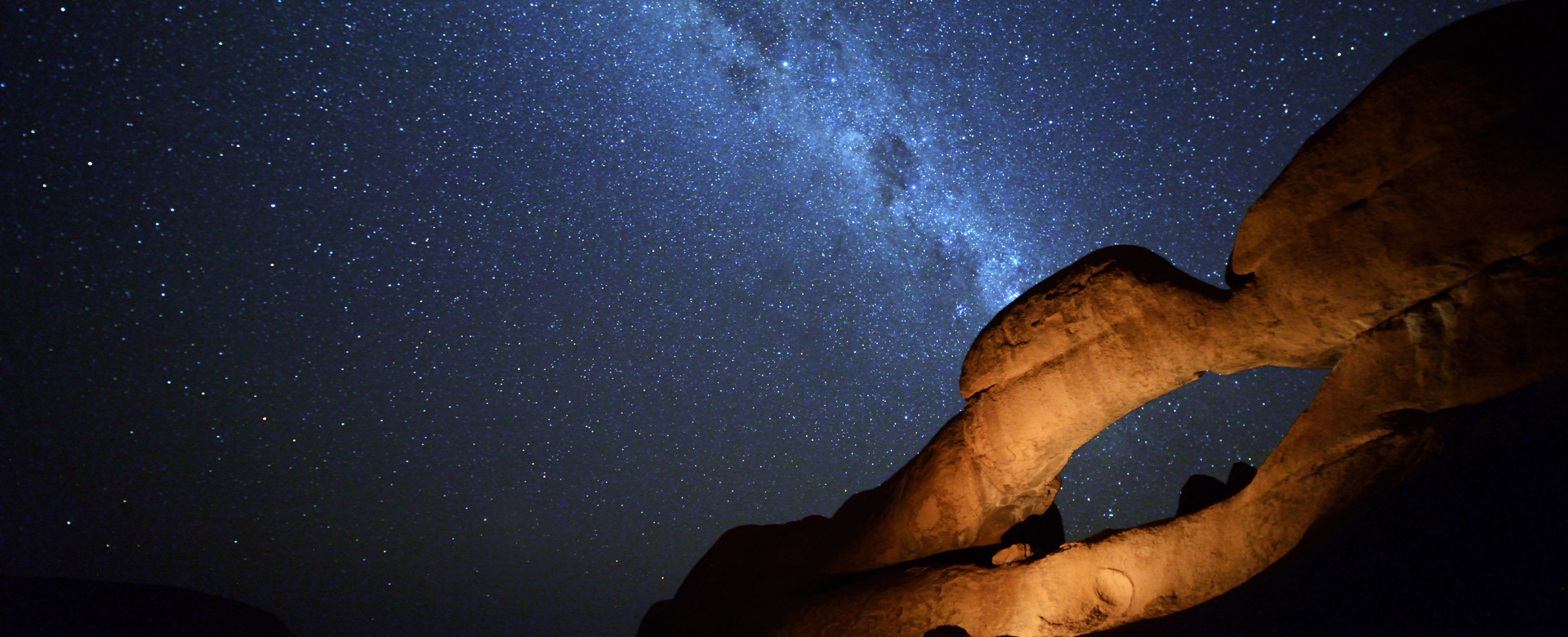 Starry sky over canyon