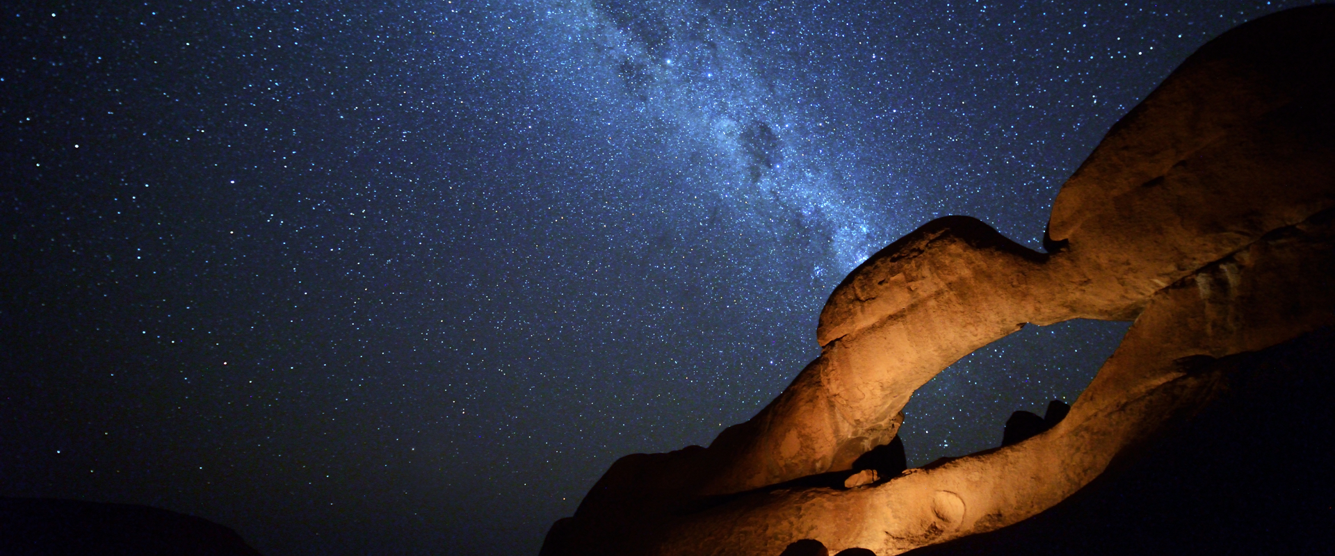 Starry sky over canyon