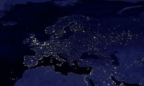 A view of Europe from space at night, showing the lights of cities and other urban areas