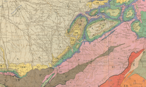 Extract from a geological map of Morocco, centred on Tahanaout, showing geological colouring in yellows, pinks, reds and browns.