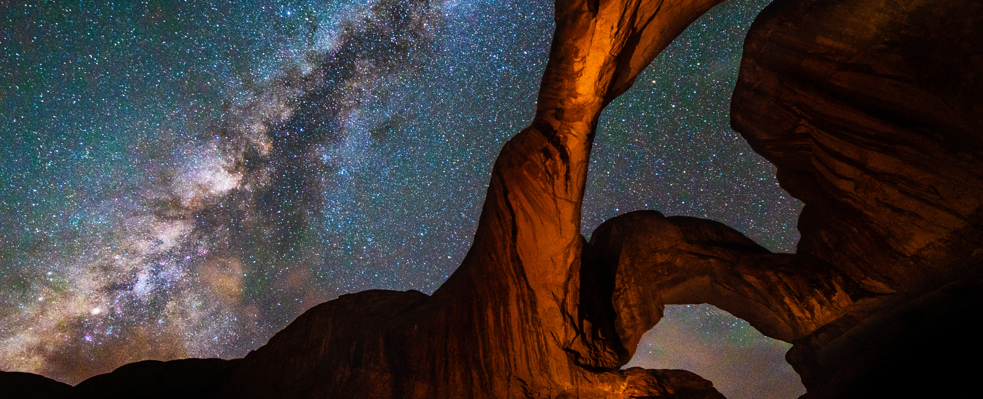 Starry sky over canyon