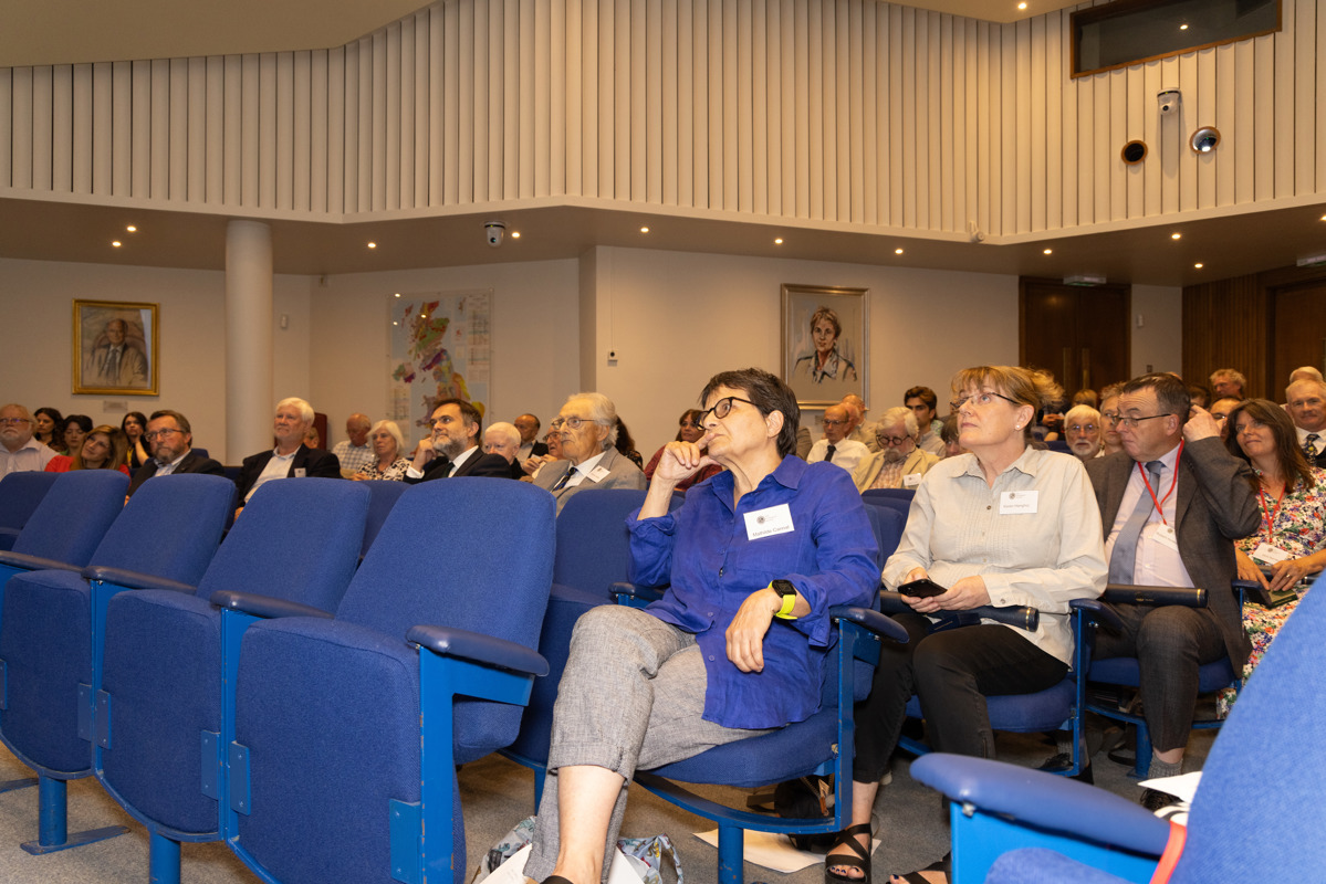 people seated in a lecture theatre