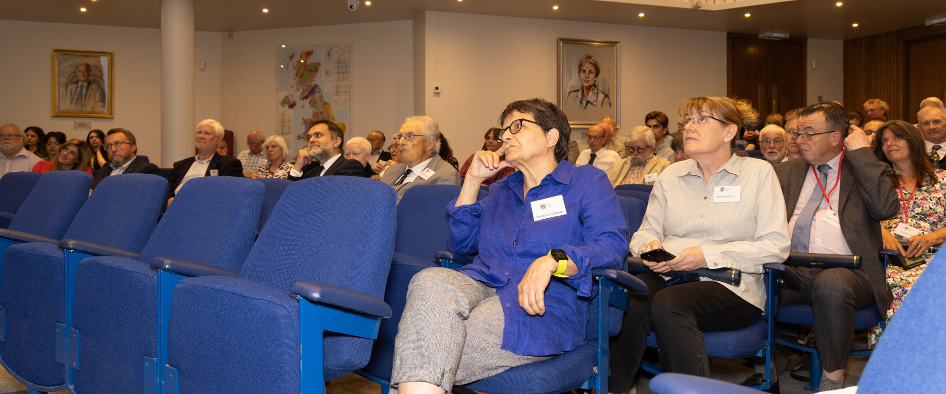 people seated in a lecture theatre